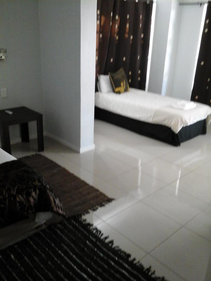 אוצ'יווארונגו Village Boutique Hotel חדר תמונה